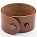 One-and-a-half-inch wide leather cuff bracelets.
